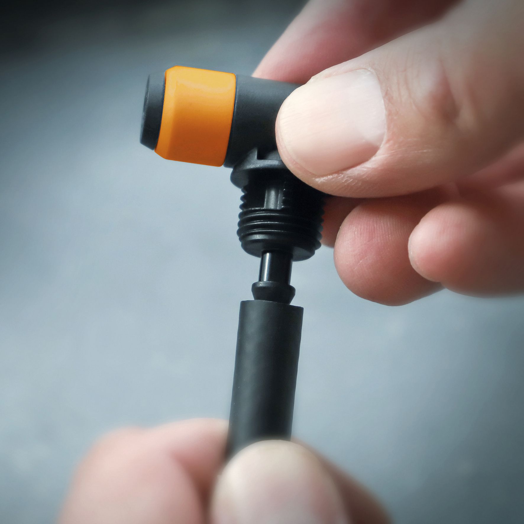 Pumpenkopf Clik Valve / schwarz, orange