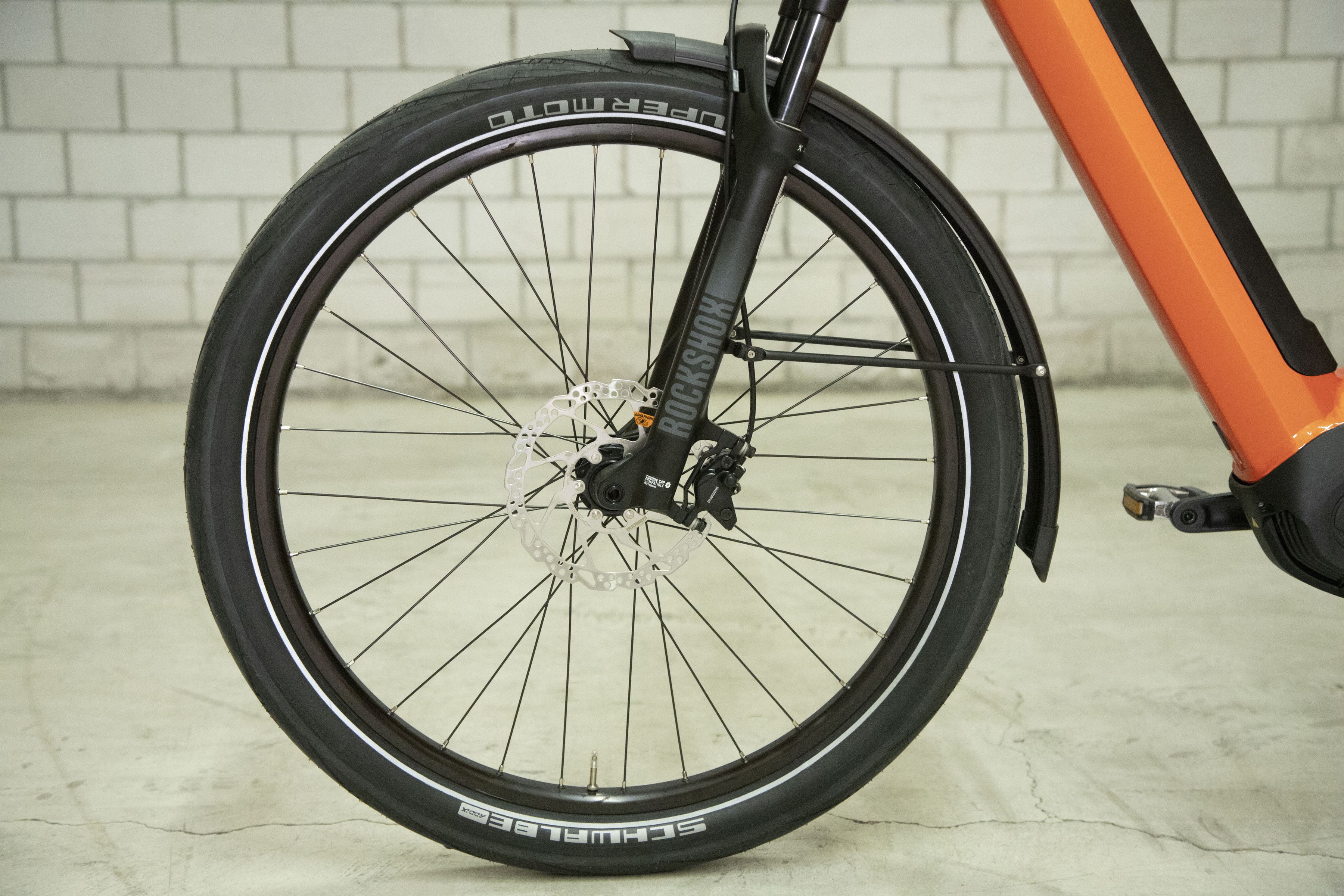 eMISSION  NEO+ Riemen E-City- und Alltagsvelo / sunset orange / 46 CM